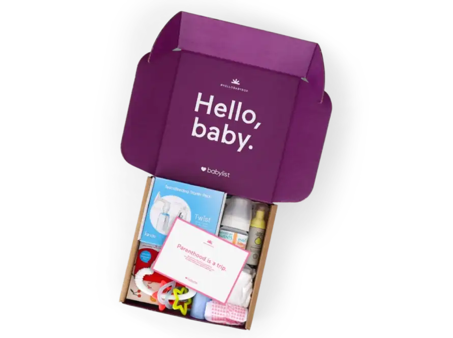 Babylist Welcome Baby Box - image of a box full of samples. The inside of the box is purple and reads "Hello, Baby!"